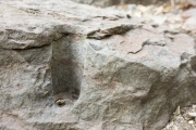 Close up of rock drill hole in stair step.