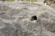 Rock drill hole in rock at CCC Quarry.