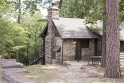 Chimney and front door of cabin.
