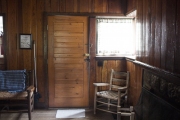 Wood paneling inside cabin and furniture built by CCC.