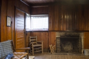 Fireplace and furniture built by CCC inside cabin.