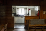 View of kitchen and furniture built by CCC inside cabin.