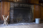 Fireplace inside cabin.
