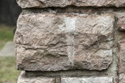 Rock drill mark on rock on cabin.