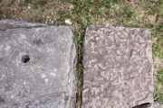Rock drill hole in front step of cabin.