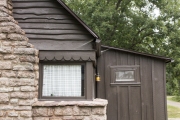 Wood and stone detail of Cabin 4 exterior.