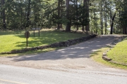 Rock retaining wall leading to cabin office.