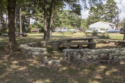 Picnic table and rock enclosure at Big Flat City Park.