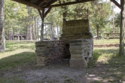 Outdoor stove under roof at Big Flat City Park.