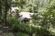 Looking down to the CCC Well House building from Highway 170