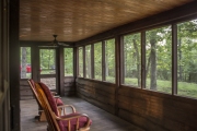 The screened-in back porch of Cabin 12