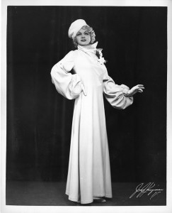 Harvey Goodwin poses as Harvey Lee in a woman's formal outfit.