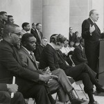 Jeannette with bowed head during Martin Luther King ceremony on Capitol steps, Little Rock, 1968