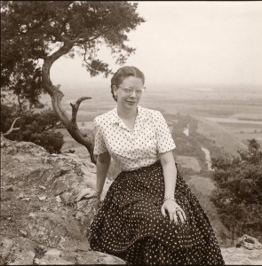 Jeannette sitting on ledge at Winrock Farms, ca. 1956