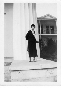 Babcock standing in front of fluted column, ca. 1936