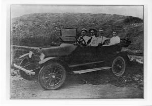 Bond family in open top car - Scott and Magnolia in backseat