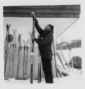 Photographic image of Woody Crockett checking his cross-country skis in Beito, Norway, circa 1967. courtesy UA Little Rock CAHC.