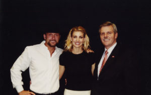 Country singers Tim McGraw and Faith Hill, with Lieutenant Governor Winthrop Paul Rockefeller, circa late 1990s