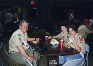 Winthrop Paul Rockefeller at lunch table with unidentified individuals, circa 1995-2005