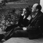 John Gould Fletcher seated next to Charlie May Simon, undated