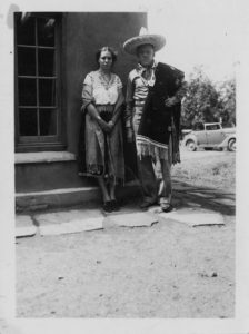 John Gould Fletcher standing next to Charlie May Simon in Mexican clothing, Mexico, 1937