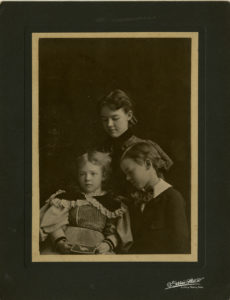 Formal pose of the siblings Adolphine, Mary, and John Gould Fletcher