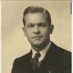 Portrait of Max Howell around the time of his term as Arkansas State Representative. He is dressed in a suit and tie with a lapel pin attached to his jacket.