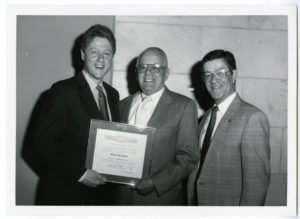 Max Howell presented a resolution for fifty-years of practicing law by Bill Clinton and Jerry Bookout.