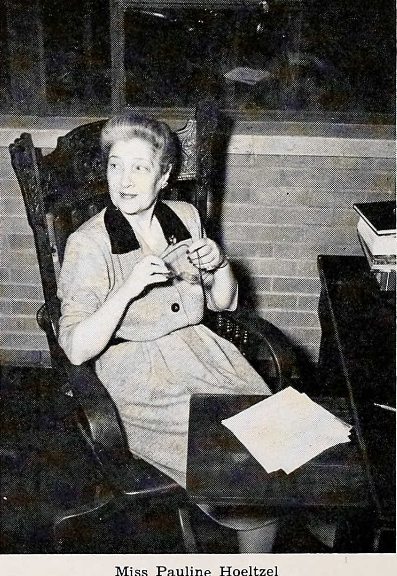 A picture of Pauline at her desk at the University.