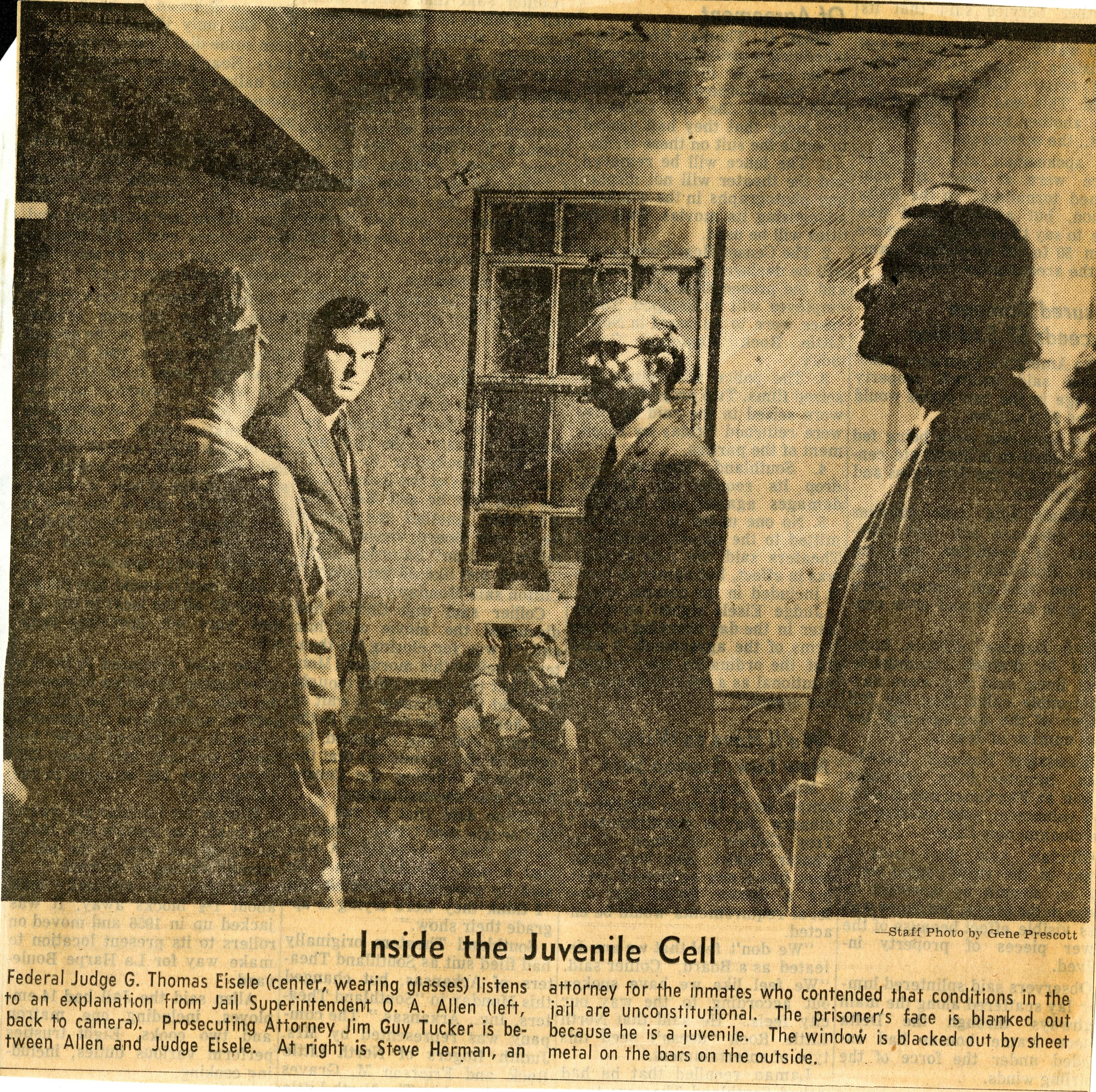 Judge Eisele is shown a cell inside a prison