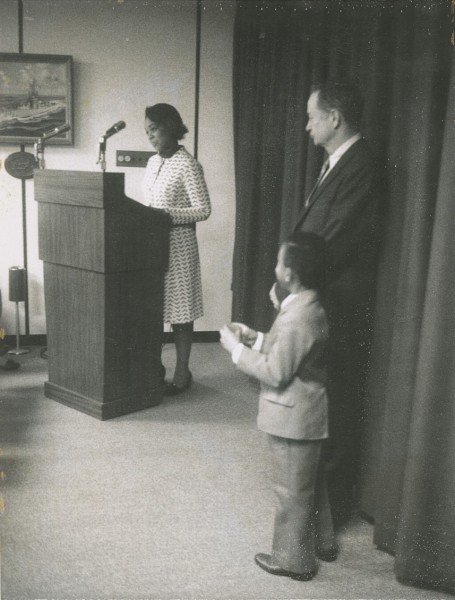 Montague receives the Navy Meritorious Civilian Service Award with her son David, 13 November 1972
