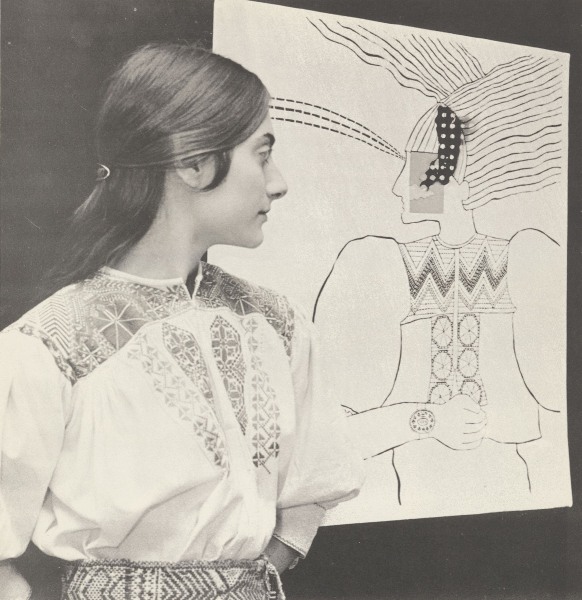 Becky Witsell Posed with one of her pieces at a gallery