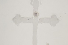 The empty space where a cross used to sit above the stations of the cross, August 2004