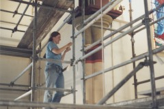 A Studio Werk artist stenciling the capital of a pillar, October 2007