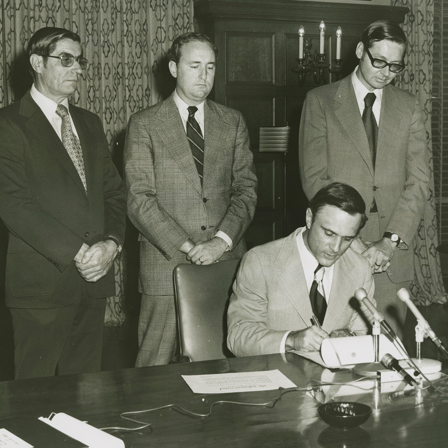 Cal Ledbetter with Charles Moore, Lacy Landers, Joe Ford, and Governor David Pryor, at the signing of the bill calling for a constitutional convention