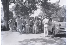 Arkansas National Guard troops assembling on sidewalk in front of Central High School