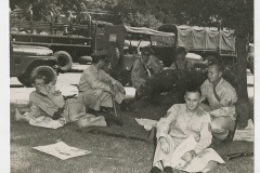 Arkansas National Guardsmen relaxing in shade on Central High School grounds