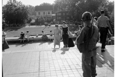 101st Airborne soldier looks on as two students enter Central High School