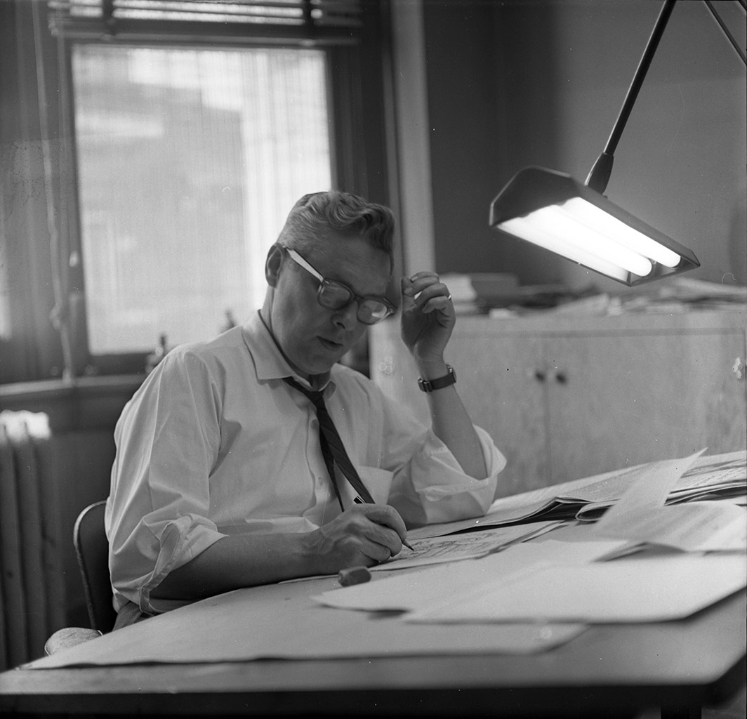 Bill Graham working at desk Bill Graham working at desk