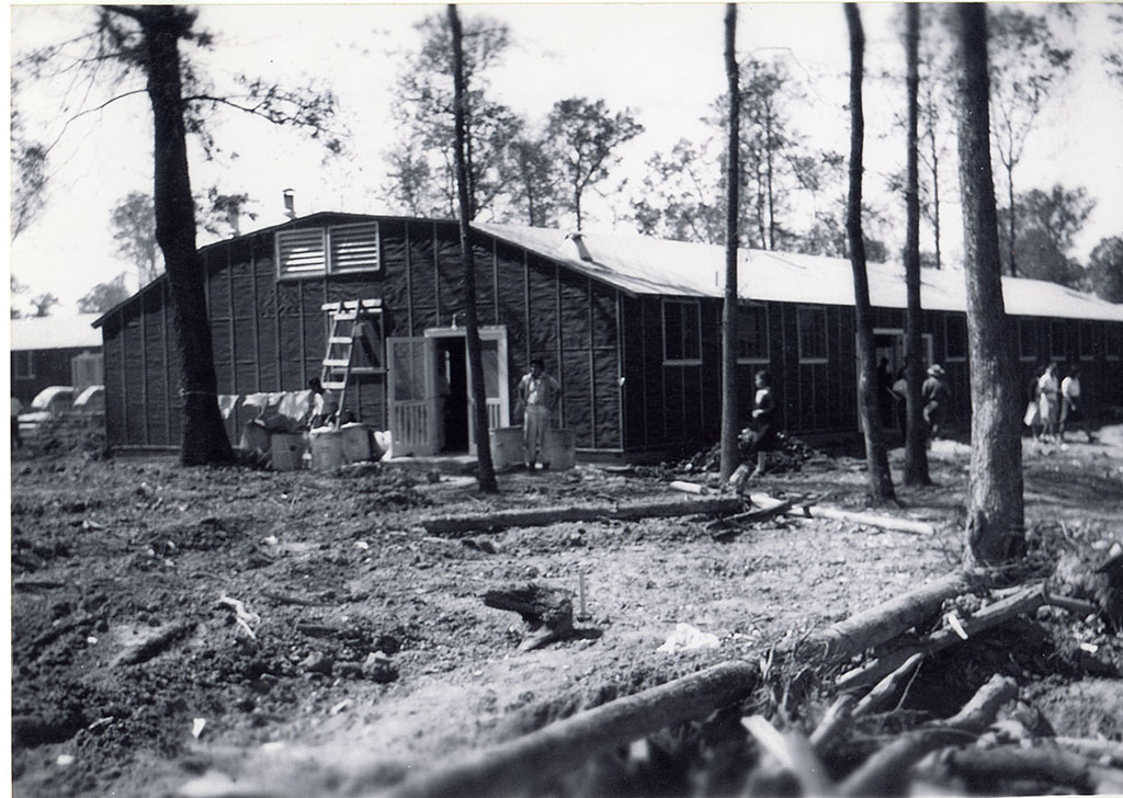 People outside of barracks at Rohwer Relocation Center
