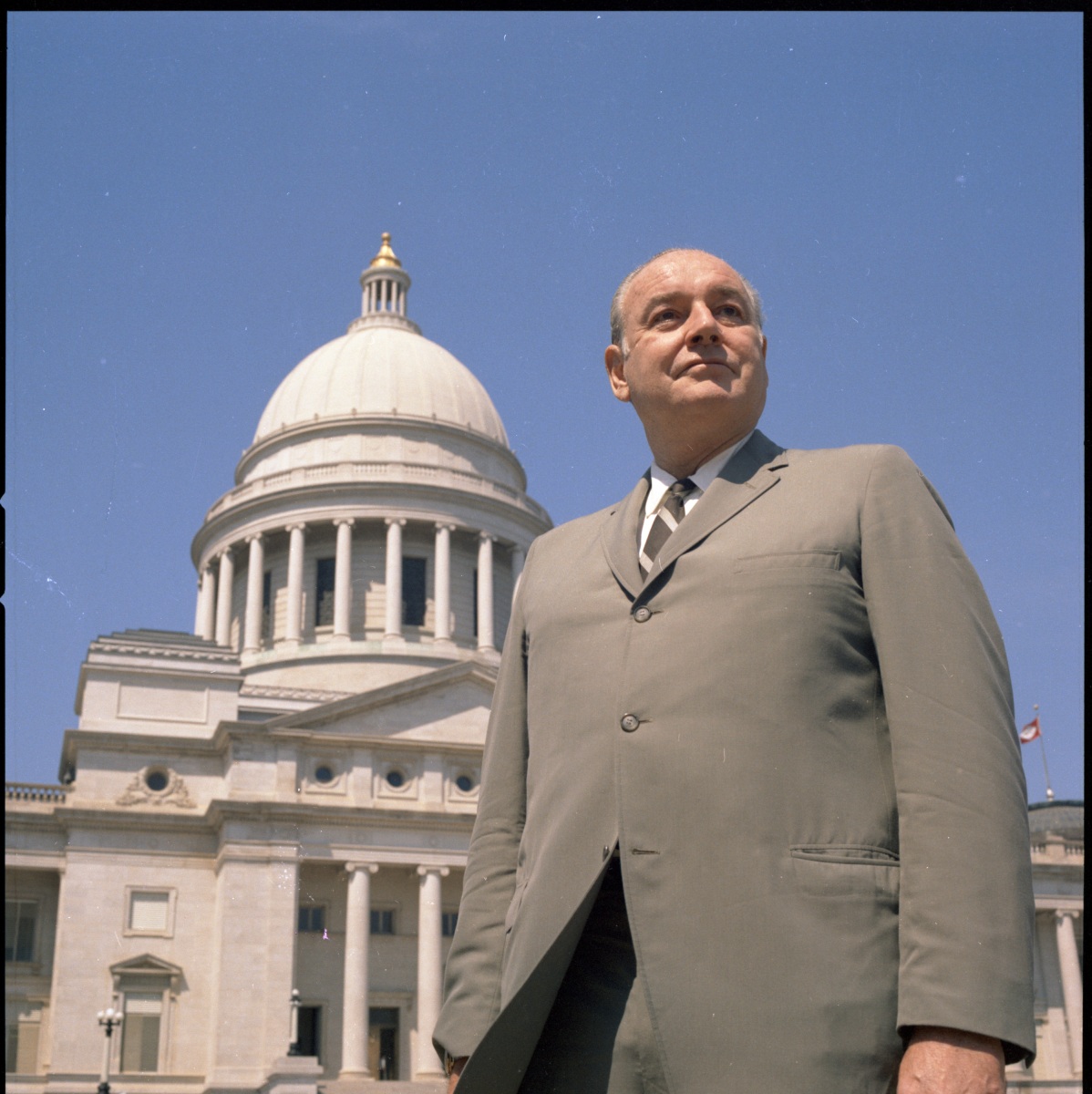 Winthrop Rockefeller standing in front of the Arkansas State Capitol Building Winthrop Rockefeller standing in front of the Arkansas State Capitol Building