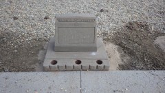 Restored filled in headstone; Filled in inscription reads ''Aoki Hidekichi, 1881-1943''