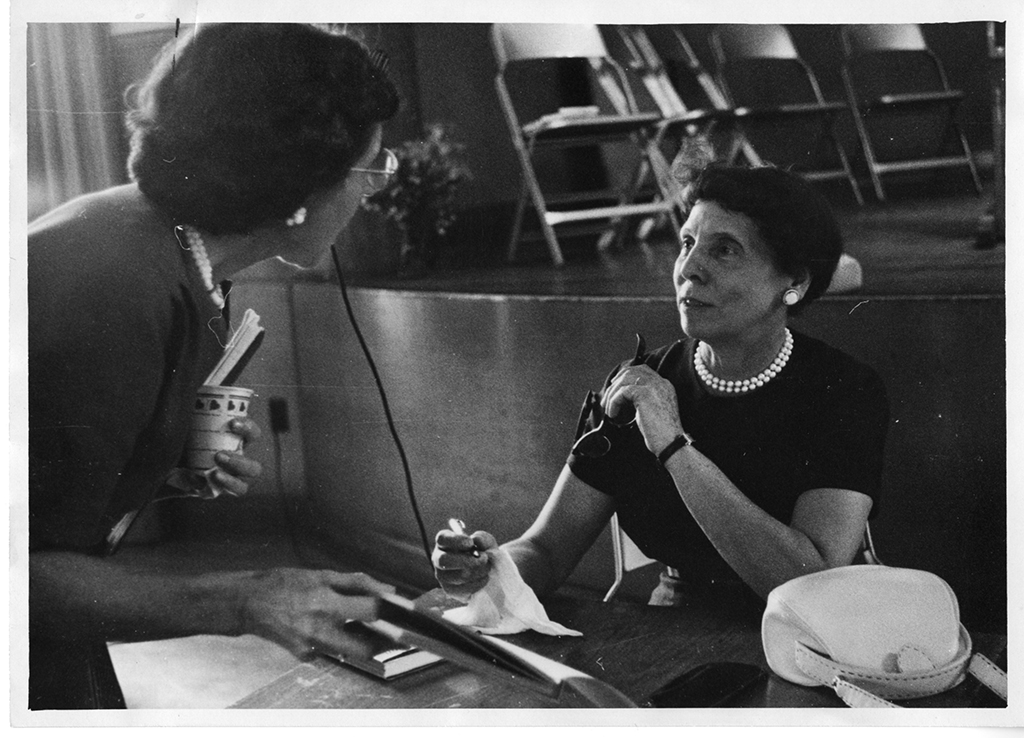 Simon with a woman during a book signing Simon with a woman during a book signing