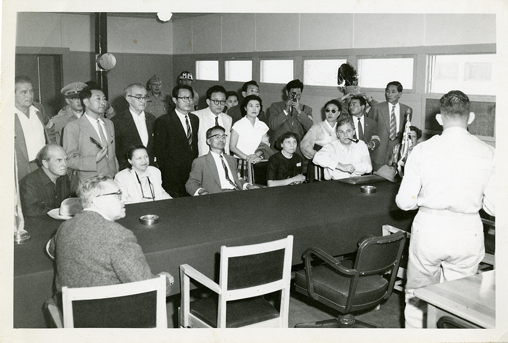 Simon at a presentation in Japan with Americans and Japanese military personnel Simon at a presentation in Japan with Americans and Japanese military personnel