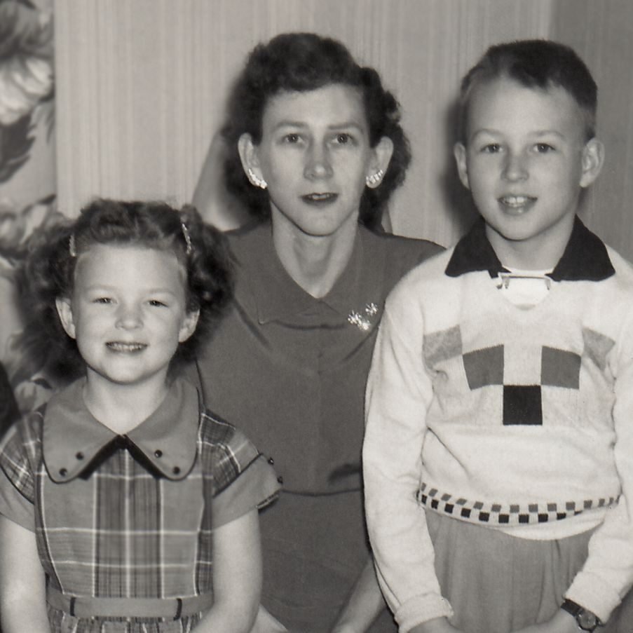 Black and white photograph of Vic Snyder with his mother Marjorie and sister Karen