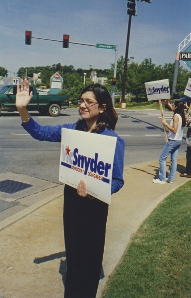 Volunteers standing on a street corner with Vic Snyder for Congress signs, circa 2002