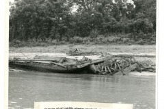 Remains of paddle wheeler unveiled by low water on White River near Wild Goose Bayou - 1900-1902 - Huddleston Steamboat Photograph Collection, ca. 1827-1976, UALR.PH.0070 - UA Little Rock Center for Arkansas History and Culture