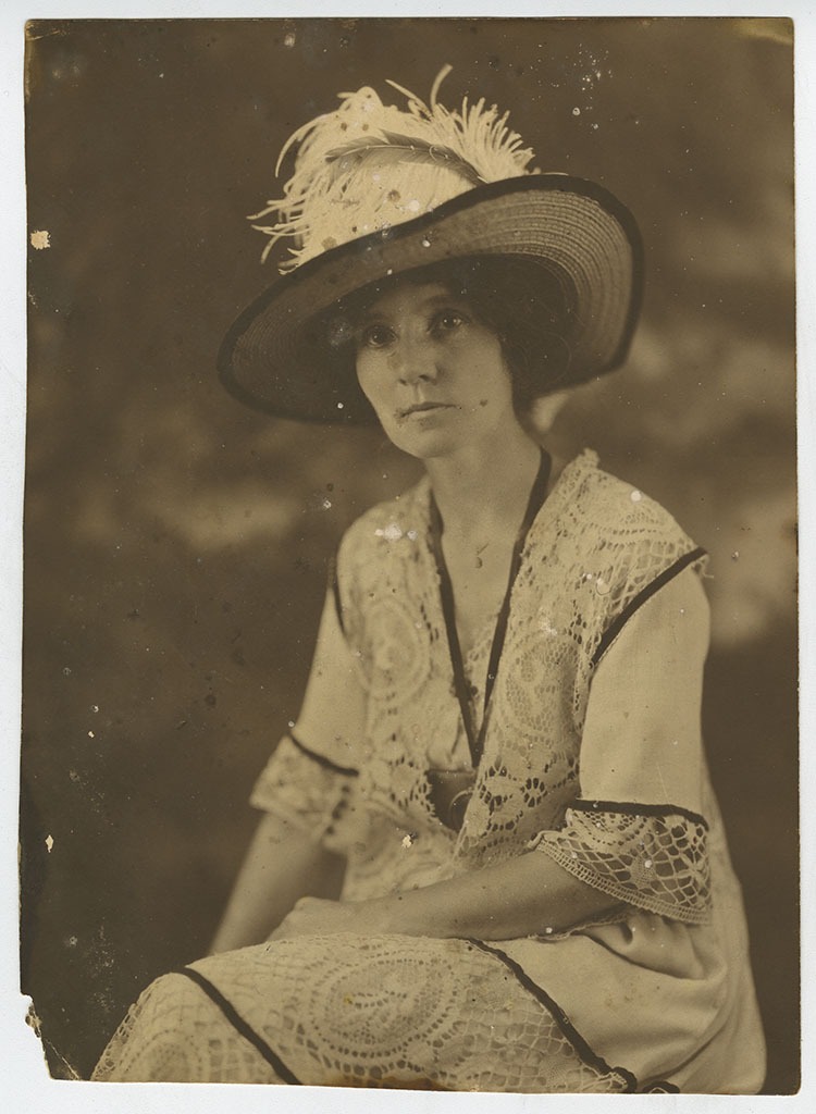 Bernie Babcock in hat and lace dress
