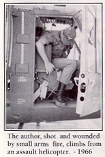 The author, shot and wounded by small arms fire, climbs from an
                                assault helicopter.