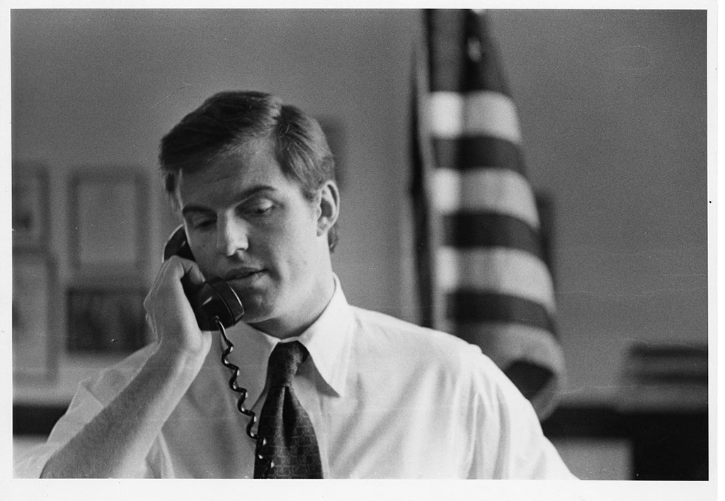 Jim Guy Tucker on telephone in office Jim Guy Tucker on telephone in office